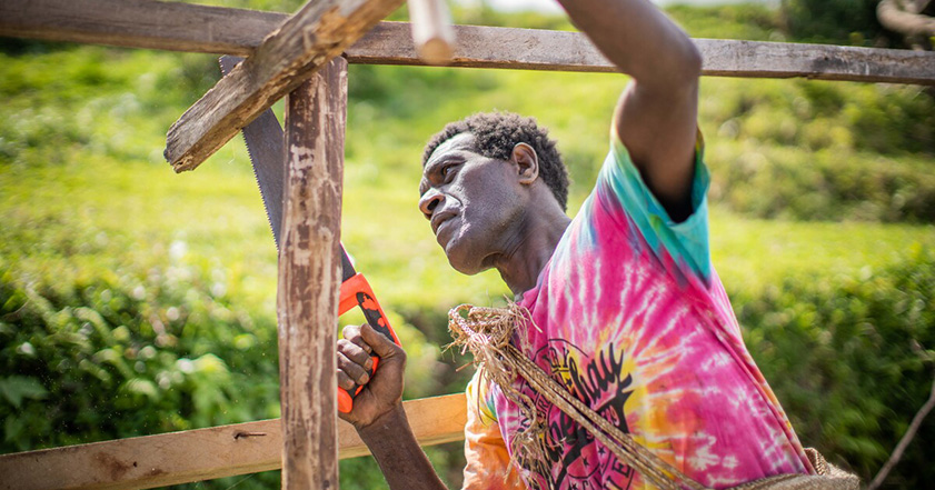 Man building a shelter on Vanuatu