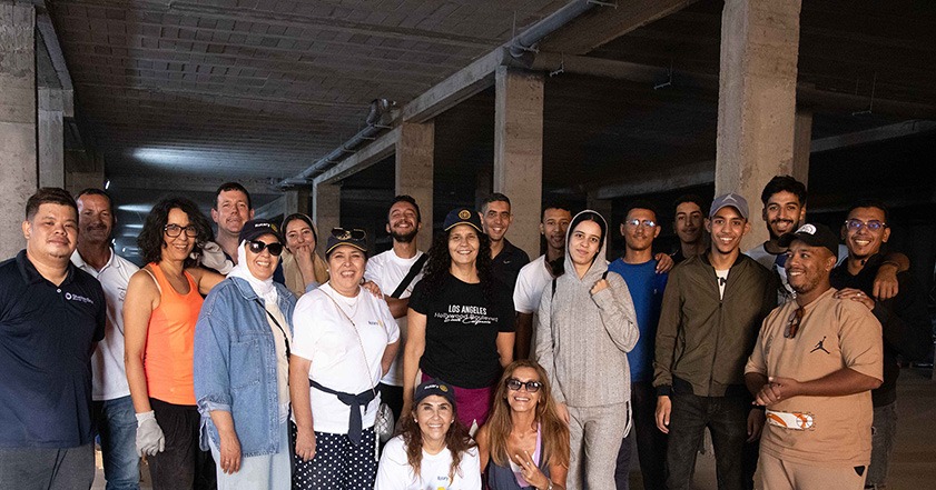 ShelterBox team members and Rotary volunteers in a warehouse in Morocco